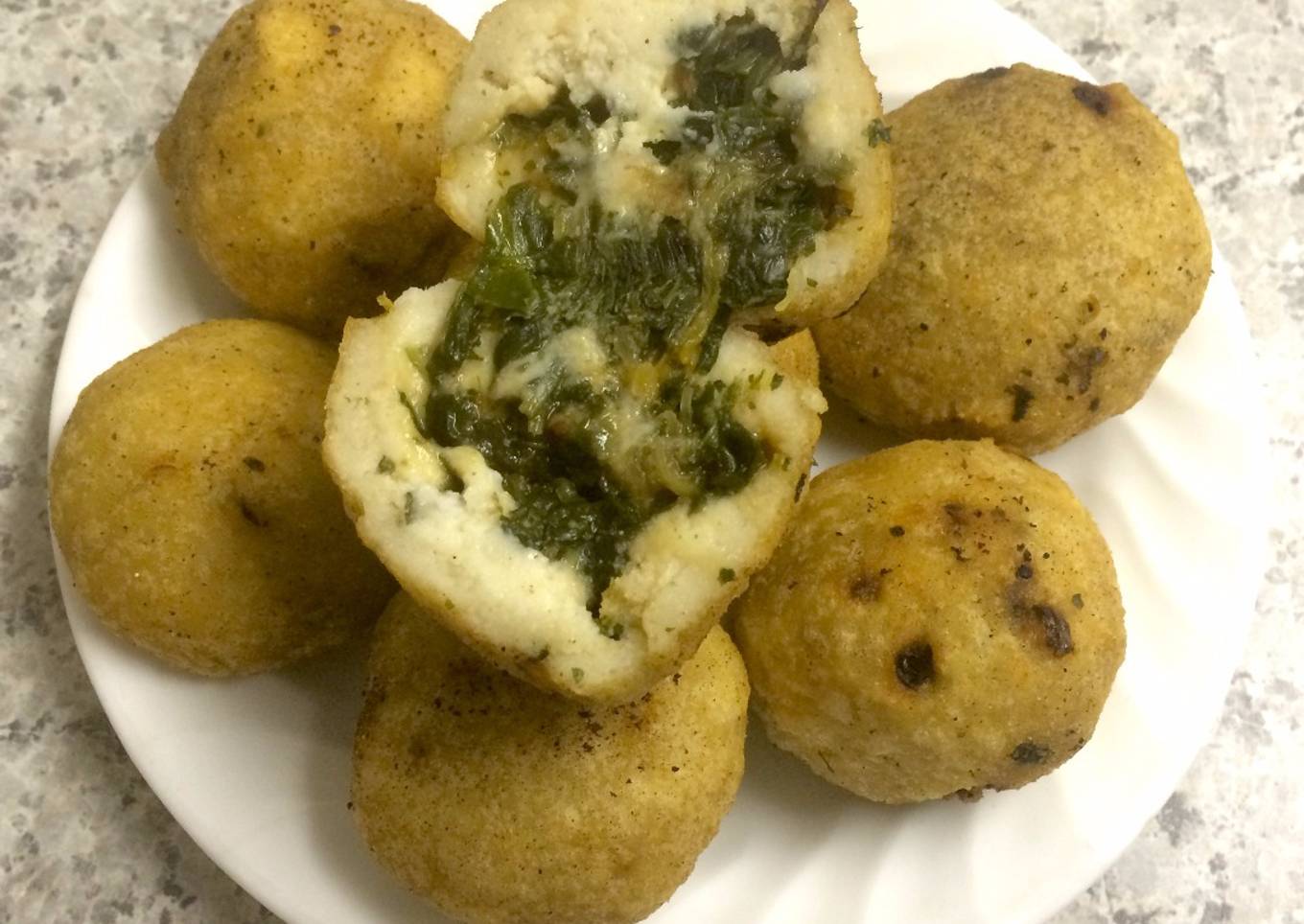 Bolitas de maíz rellenas de espinaca y calabaza
