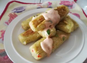 Una foto de Taquitos de Chayota rellenos con Queso