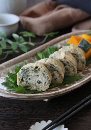 A picture of Japanese Rolled Omelet with Myoga and Shiso.