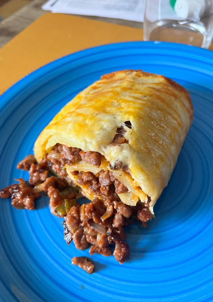 Una foto de Rollo de patata relleno de carne