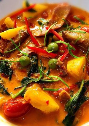 A picture of Grilled Pork Neck Red Curry (Gaeng Phed Moo Yang).