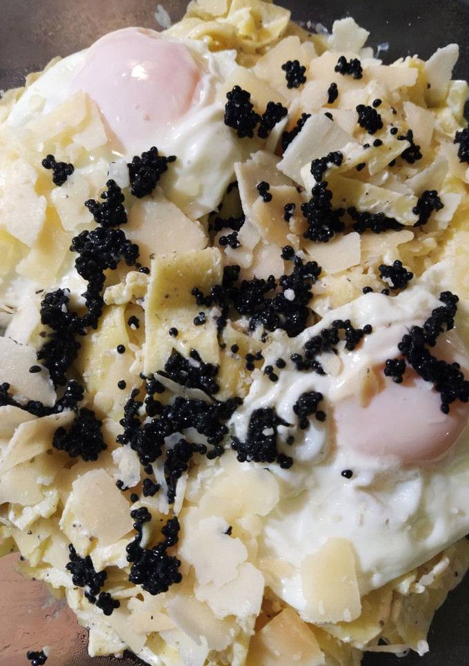 Una foto de Papardele tartufo parmigiano al estilo Tagliatella