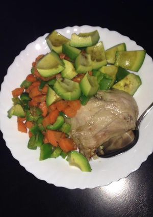 A picture of Boiled chicken, steamed carrots and avacado.