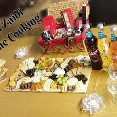 A picture of 🧀🥓🍇🍪🍊🌰🍹Charcuterie Board(cheese board)🧀🥓🍇🍪🍊🌰🍹.