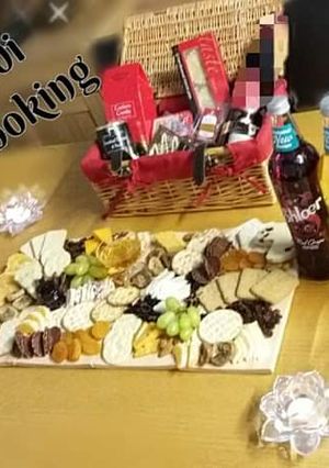 A picture of 🧀🥓🍇🍪🍊🌰🍹Charcuterie Board(cheese board)🧀🥓🍇🍪🍊🌰🍹.