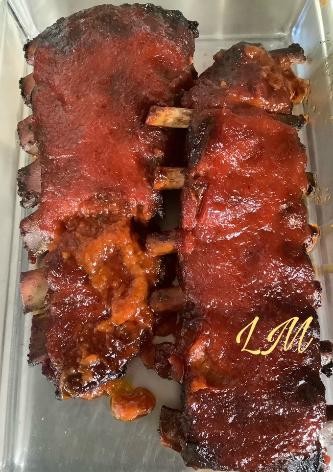 Una foto de Costillas ibéricas en salsa barbacoa