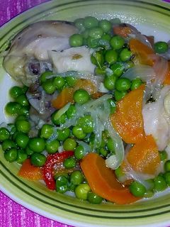 Una foto de Pollo arvejado