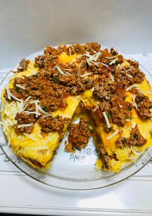Una foto de Polenta en Salsa Roja con carne Molida Queso!!