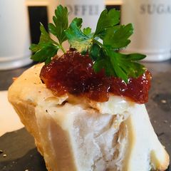 A picture of Goats Cheese and Red Onion Chutney Breads.