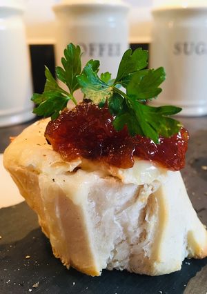 A picture of Goats Cheese and Red Onion Chutney Breads.