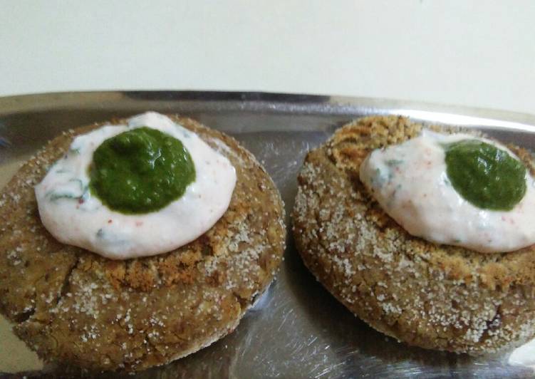 Black Chana cutlet topped with hung curd and coriander mint chutney