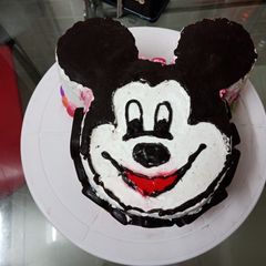A picture of Mickey Mouse chocolate cake.