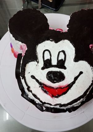 A picture of Mickey Mouse chocolate cake.
