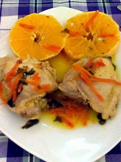 Una foto de Contra-muslos con naranja y zanahoria