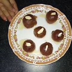 A picture of Biscuit ke Gulab Jamun.
