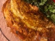 Una foto de omelette en salsa