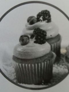Una foto de Cupcakes de Arandano