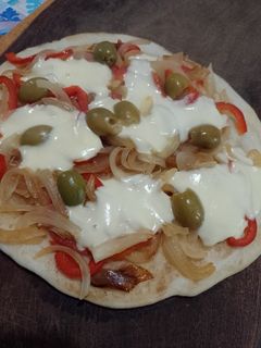 Una foto de Pizza de harina de arroz en sartén