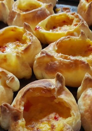 Una foto de Humitas con jamón y queso