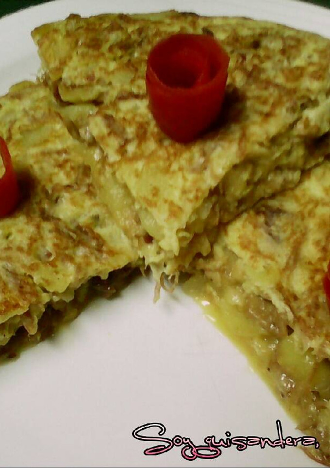 Una foto de Tortilla de patata con ropa vieja de cocido