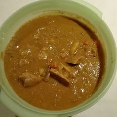 A picture of Curried split pea soup with beef bones.