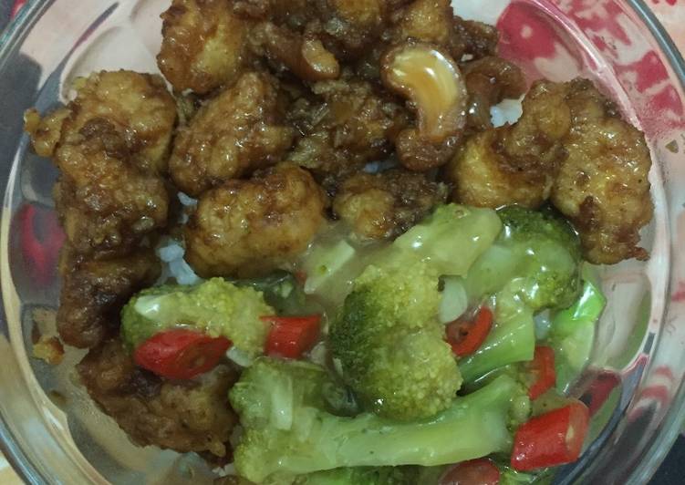 Chicken kungpao with broccoli in a rice bowl
