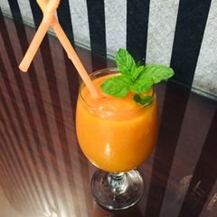 A picture of Mangoes and plum slush.