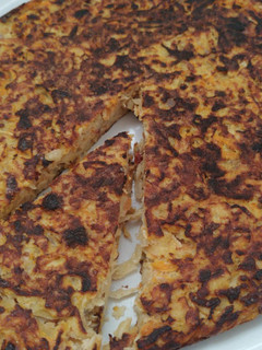 Una foto de Tortilla de papa rallada