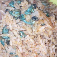 A picture of Periwinkle 'peppersoup' rice.