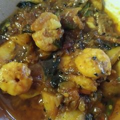 A picture of Shrimps with coriander leaves.
