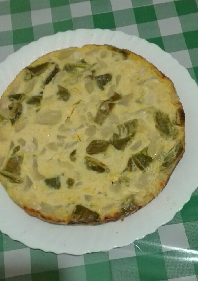 Una foto de Tortilla de calabacín y pimiento verde