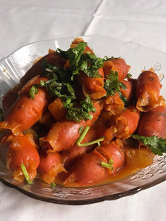 Una foto de Chorizos en salsa agridulce