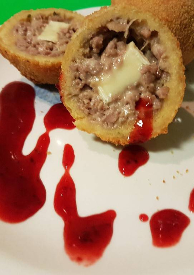 Una foto de Bombas de carne y camembel