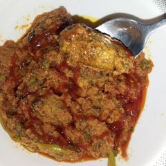 A picture of Badaami gola kabab salan.