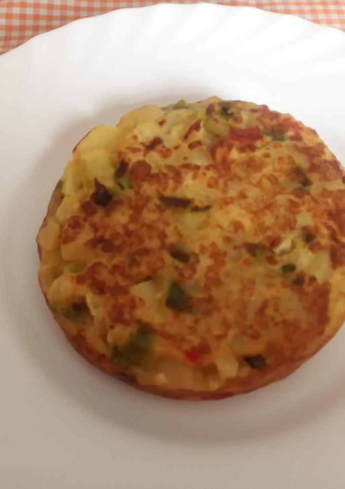 Una foto de Mini tortillas de pimientos producto congelado