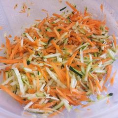A picture of Carrot and cucumber salad.