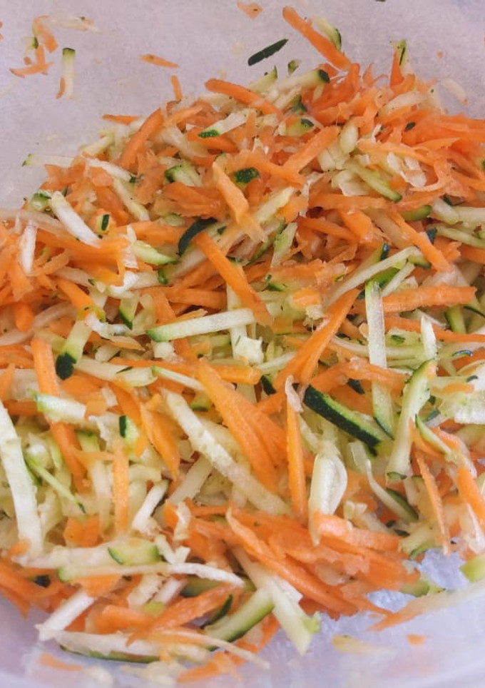 A picture of Carrot and cucumber salad.