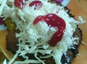 Una foto de tostones de plátano verde