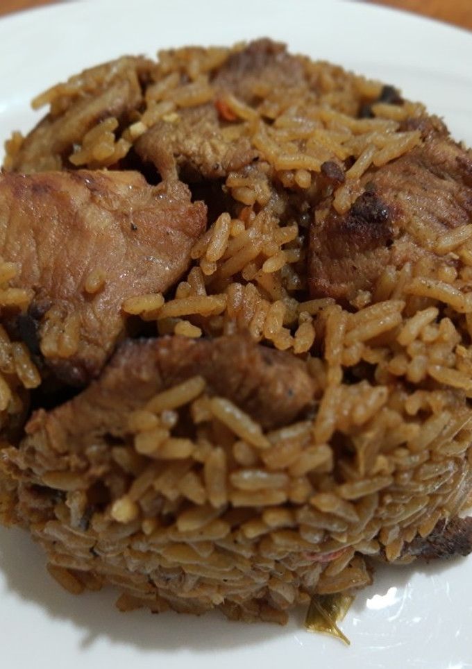 Una foto de Arroz con cerdo en caldero