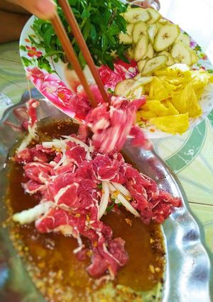 Hình của món Bò né sốt me.