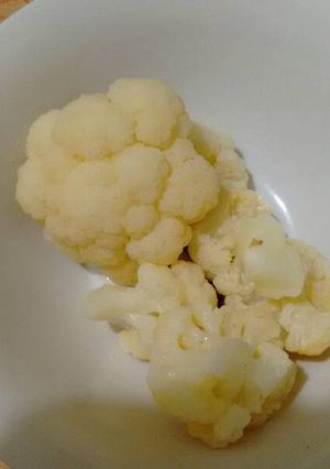 Una foto de Coliflor con queso. ॐ