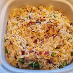 A picture of Orzo Pasta with Garlic, Mushroom and Green Peas.