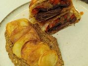 Una foto de pimientos rellenos con ricota