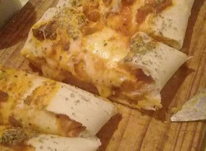 Una foto de 🍕Arrollado de pizza 🍕