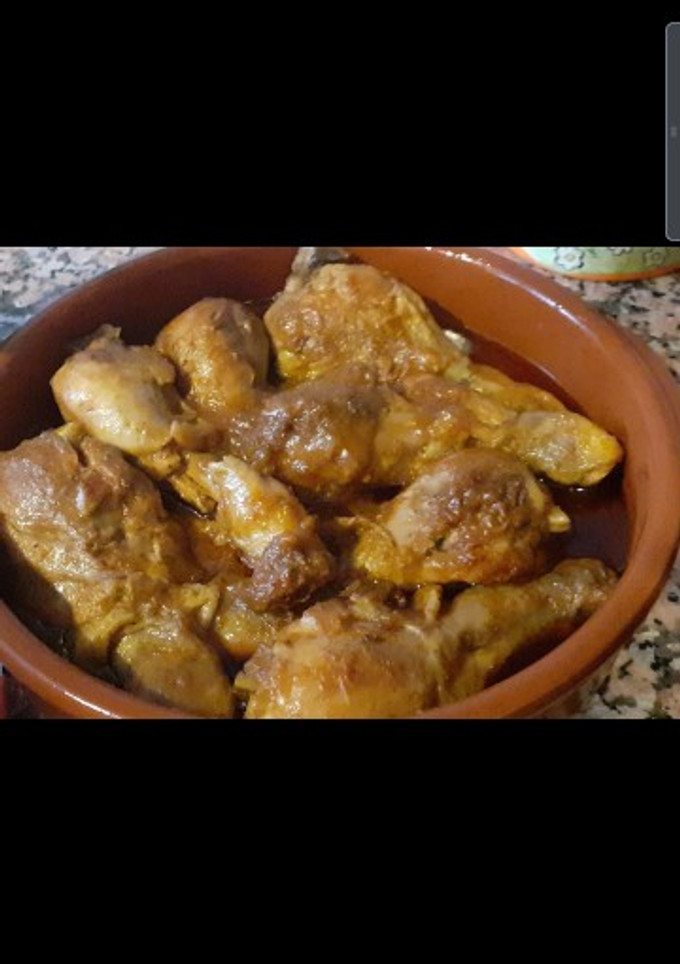 Una foto de Muslo de pollo rustido