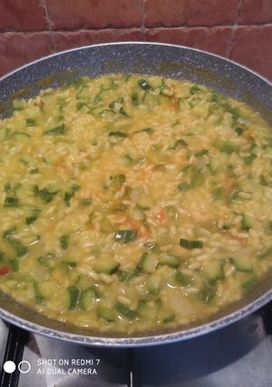 Foto di Risotto con zucchine, fiori di zucca e zafferano