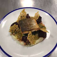 A picture of Salmon,Balsamic beetroot, sweet potato purée, spinach, sauce vierge, raisin&caper vinaigrette.