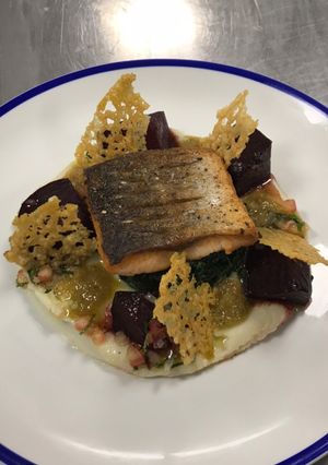 A picture of Salmon,Balsamic beetroot, sweet potato purée, spinach, sauce vierge, raisin&caper vinaigrette.
