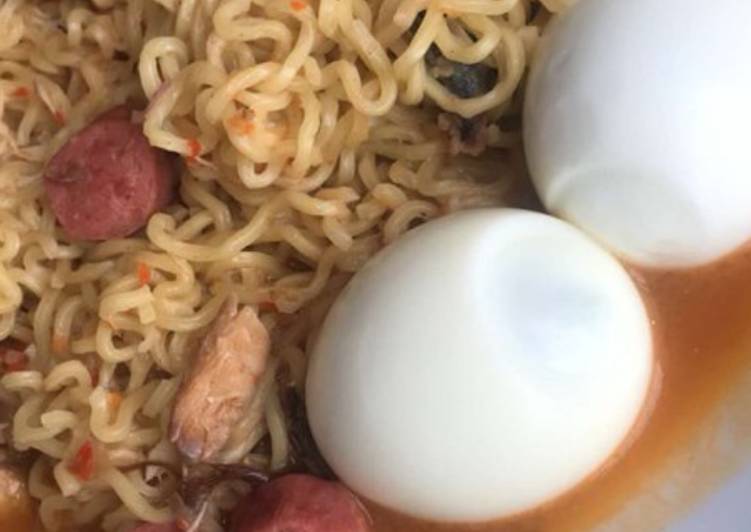 Noodles with sausage rolls and sardine
