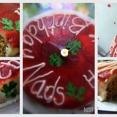 A picture of Chicken keema cake with Mashed Potato icing and tomato Ketchup.